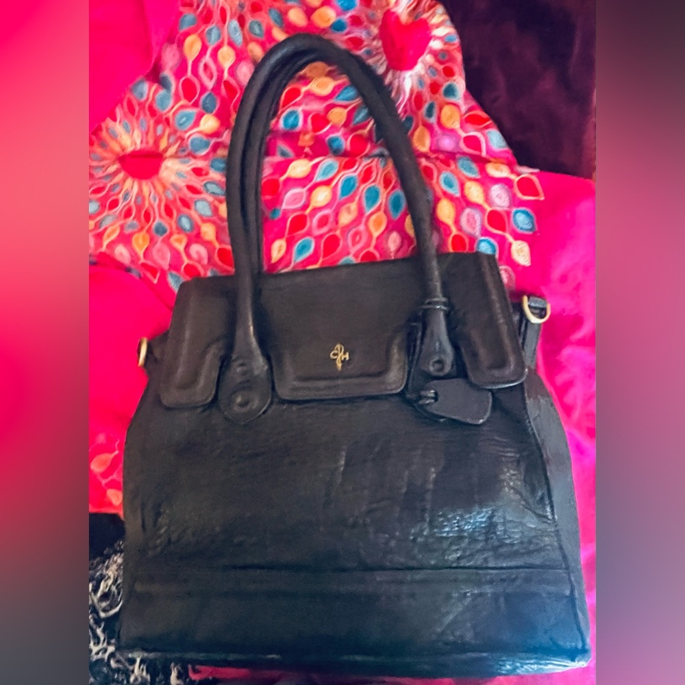 Butter soft Cole Haan black lambskin leather bag. Apx 5 x 10 x 12“. EUC …